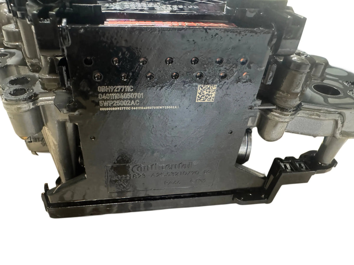0BH927711C part number and OEM label stamped on used DQ500 mechatronic unit