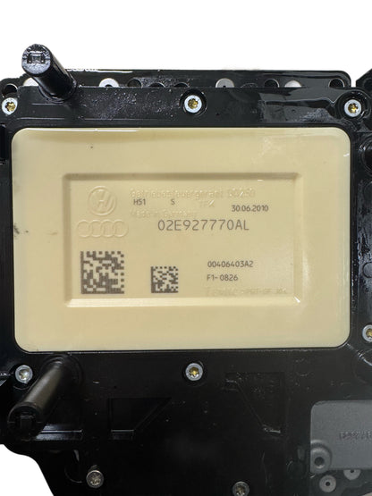 02E927770AL complete mechatronics control unit closeup showing TEMIC manufacturer label, part number, and QR codes
